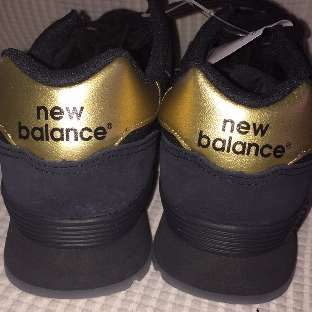 New balance metallic gold and black